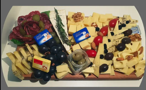 Presentación de tabla de quesos artesanales Cremo Frossard